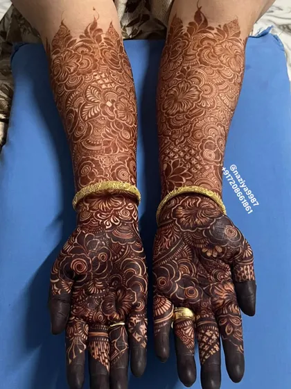 The result after two days. I make my own 100% natural henna paste, and this is the deep, rich 'rang' you can expect. Proper aftercare, which I'll guide you on, helps achieve this beautiful, long-lasting bridal stain.