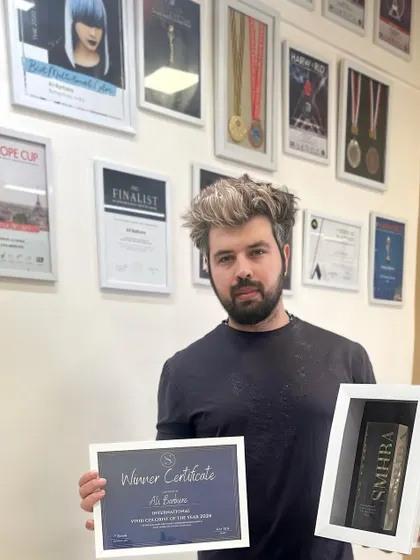 I don't just compete, I win. Holding my 2024 SMHBA Champion award is a testament to the dedication I bring to my craft every single day. When you sit in my chair, you're getting service from a world champion.