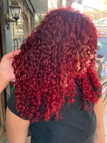 A side view of the fiesty red curls. The color is so vibrant and fun. (No filter)