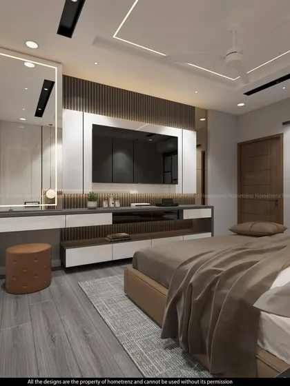 Another angle of the master bedroom, showing the integrated TV and vanity unit. The design is both practical and elegant.