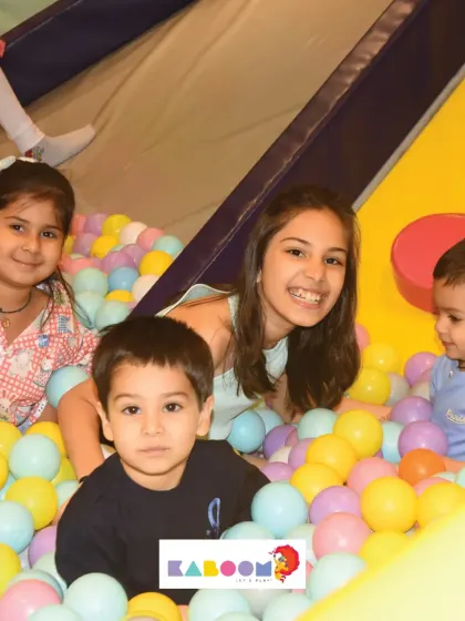A group of friends enjoying the ball pit together. Shared moments of fun are the best!