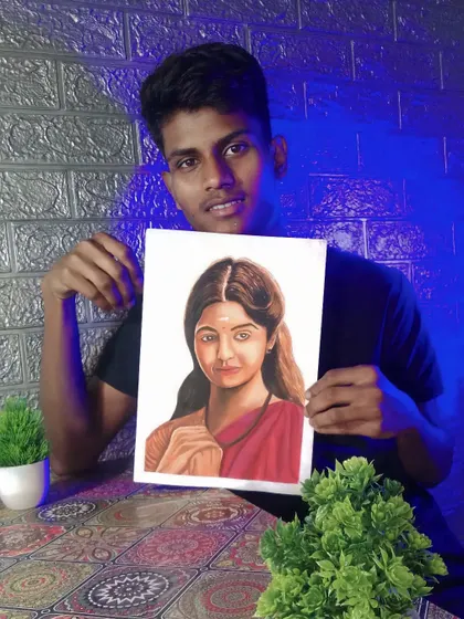 Here I am holding my half-finished watercolor portrait. This shows the painting in context and gives a sense of its scale.