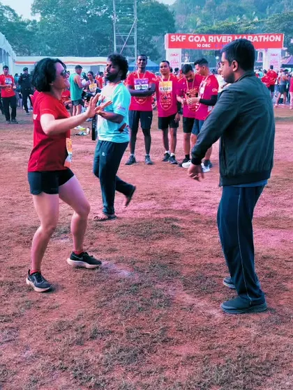 A fun, candid moment of dancing after the Goa River Marathon. We celebrate our hard work!