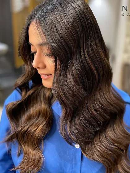 A final shot of this balayage masterpiece, showing off the beautiful dimension and movement in the hair.