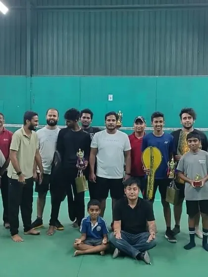 The full group of players from our Badminton Open, celebrating the champions and runners-up in both singles and doubles categories.