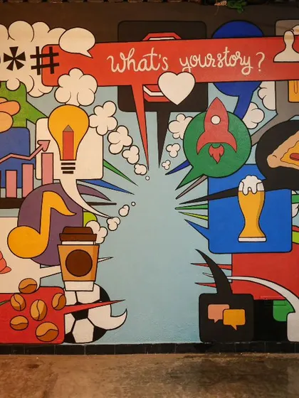 What's your story? This fun, pop-art mural for YourStory Media is an interactive selfie spot, filled with vibrant icons that represent the world of media, tech, and entrepreneurship.