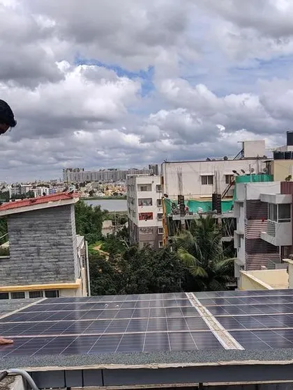 One of our solar ninjas at work, performing final checks on a rooftop installation. Our team is dedicated to ensuring every panel is perfectly placed and secured for optimal performance and longevity.