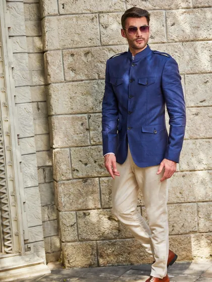 A final look at the deep blue Jodhpuri jacket, a piece that turns the spotlight on you and your bold fashion statement.