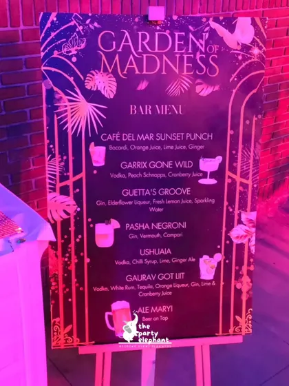 I design every detail to match the theme, including this custom bar menu for the 'Garden of Madness' party, featuring themed cocktail names and stylish graphics.