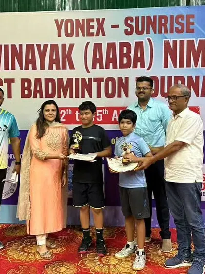The official prize distribution ceremony for the U13 Boys' Doubles. Public recognition at tournaments builds confidence in our young players.