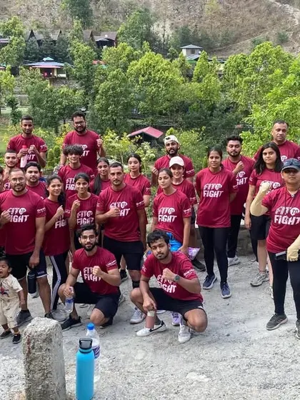 The full squad posing together during our MMA camp in Uttarakhand. We believe that training together in new environments builds a stronger, more resilient team.