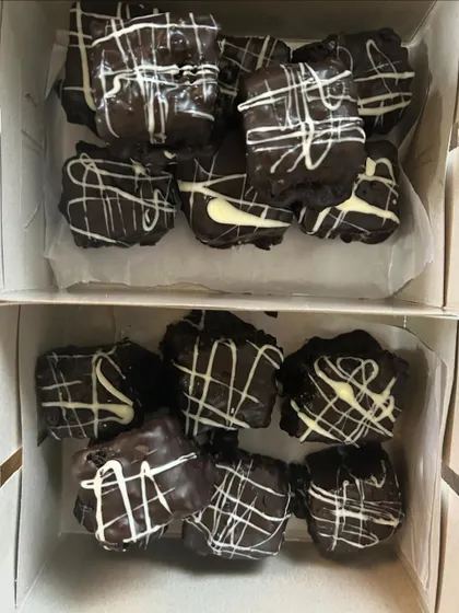 Boxes of rich Double Chocolate Brownies, ready for delivery.