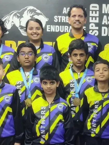 Team Panthers showing off their medals after a successful State Level Taekwondo Championship in Doddaballapura, where they bagged 4 Gold, 2 Silver, and 2 Bronze medals.