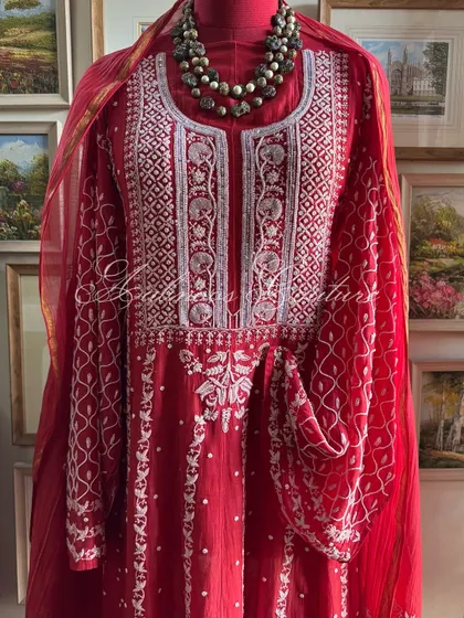 A mannequin shot providing a clear perspective of the Anarkali's silhouette and how the dupatta drapes over the shoulders.