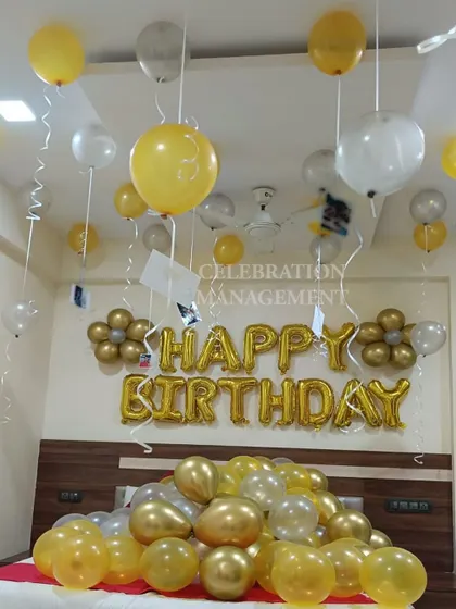 Hanging photos from the balloon ribbons is a wonderful way to personalize the decoration and remind the person of all your happy memories together.