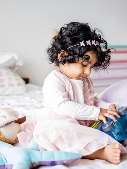 A quiet moment of play for this little girl and her favorite truck. I always encourage including your child's special toys to make the photos even more personal.
