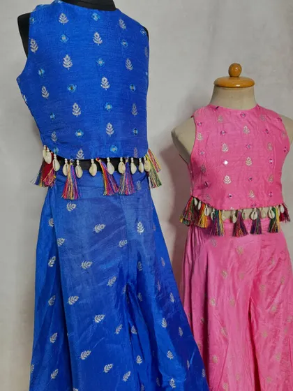Fun and festive sharara sets for sisters. We can create the same design in different custom colors, like this royal blue and bright pink, to match each girl's preference.