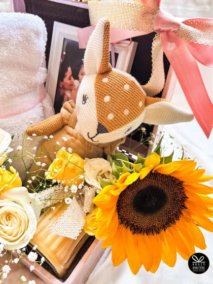 Another angle of the sunshine hamper, highlighting the beautiful arrangement of fresh sunflowers and roses.