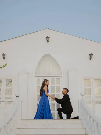 A romantic proposal on the steps of the chapel set. This is a perfect way to recreate or imagine a special moment in a beautiful, controlled environment.