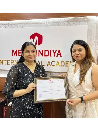 A proud graduate holding her certificate, ready to apply her newly learned skills professionally.