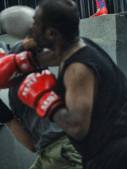 A direct hit during a sparring session. This is what we train for, to be able to take a shot and keep moving forward.