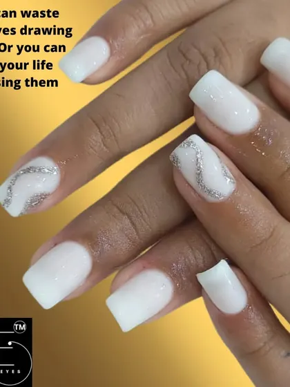 A clean and bright white manicure on square nails. The simple silver glitter swirl on the accent nails adds just the right amount of sparkle.