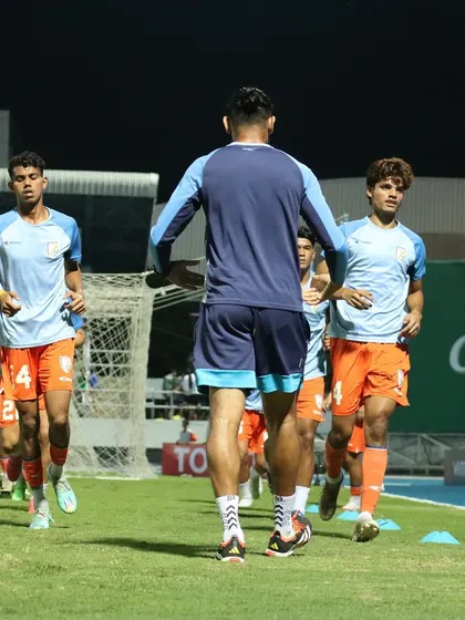 Leading the Indian U17 team through warm-up drills before a crucial match. The focus here is on dynamic movement and muscle activation to ensure every player is physically and mentally prepared for competition.