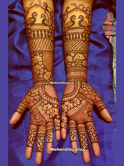 A still shot of the beautiful peacock engagement henna. The details in the feathers and the symmetry of the design are what make it so special.