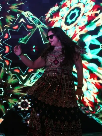 A solo performance against a stunning kaleidoscope LED backdrop. We help performers use the stage and visuals to their full advantage, creating a powerful and captivating moment.