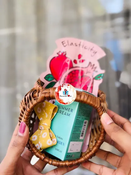 A mini Valentine's gift basket, perfect for a small gesture. It contains a face mask, a cute bow, and other small self-care items.