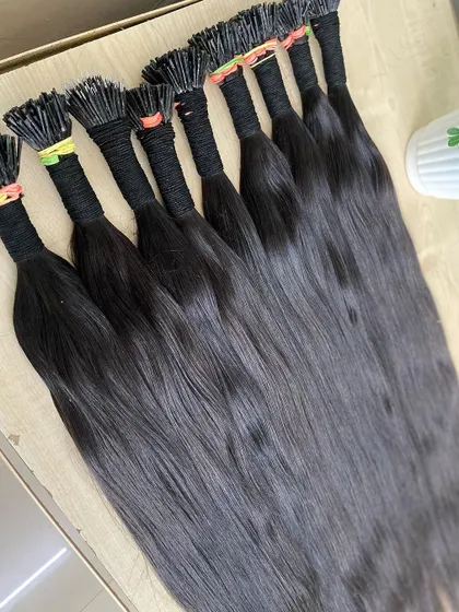 An array of our natural black I-Tip extensions, prepared and bundled for a wholesale order. We ensure consistency and quality across all our bulk supplies.