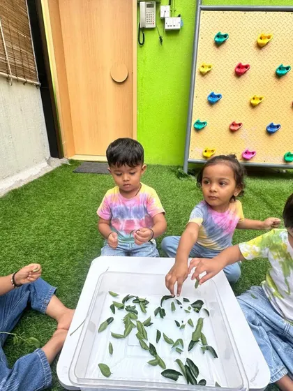 Each activity, from making Bhel Puri and toast to plucking methi leaves and exploring what floats, is a lesson in itself. These practical life and sensorial activities are central to the Montessori method, helping children develop fine motor skills, concentration, and a deep understanding of the world through their own actions.