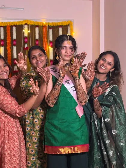 Another joyful group shot, capturing the fun and excitement of a mehendi party.