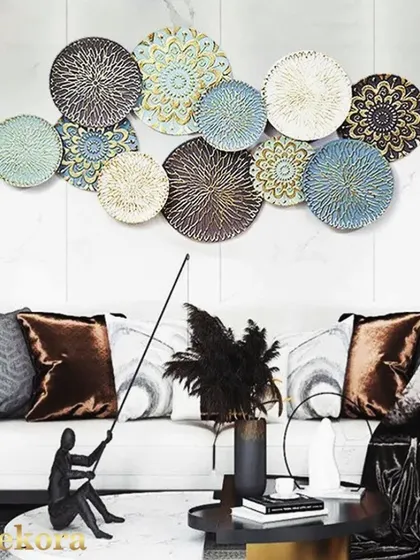 This luxury wall decor features a collection of intricately patterned plates in a muted, earthy color palette, perfect for a sophisticated and modern living space.