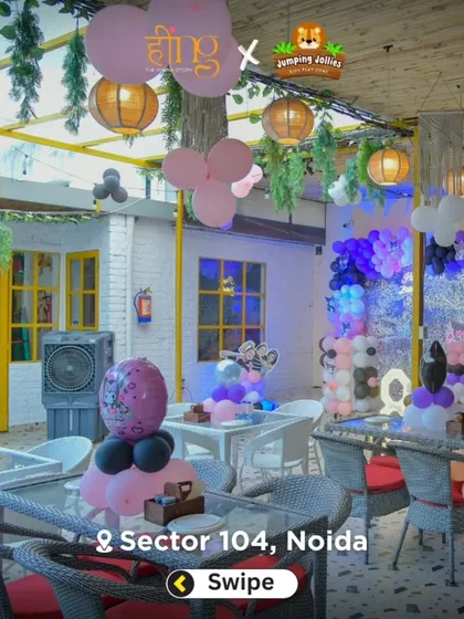 The dining area decorated for a Kuromi-themed party, with black, pink, and purple balloons creating a fun and stylish atmosphere.