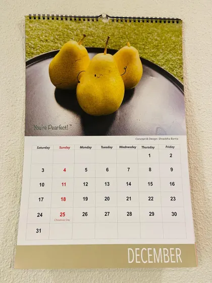 The December page of the 2022 calendar, with a trio of "Pearfect" pears.