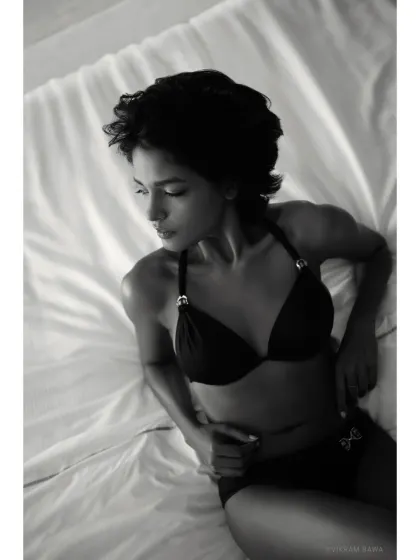 The absolutely unreal raw beauty of Nikita Sahay. This black and white boudoir shot is all about texture, mood, and quiet sensuality.
