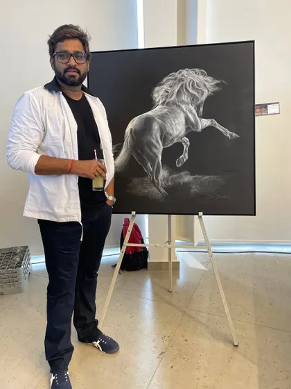 At a Hyderabad art show with the Honorable Jayesh Ranjan ji (IAS), standing next to my white horse artwork.
