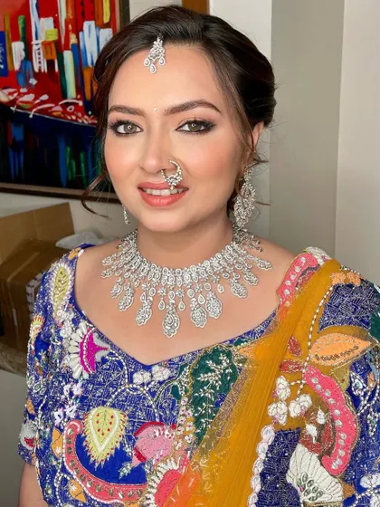 A smiling portrait that captures the excitement of the baraat.