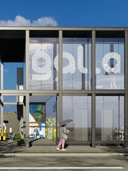 The entrance to the Galla Foods center. The design uses a simple, modular steel frame, which allows for a high degree of transparency and a flexible interior layout.
