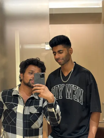 A profile shot of Mayank Yadav's haircut.
