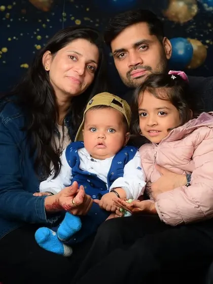 A lovely family portrait with everyone looking at the camera. We take a variety of shots during a session to give you plenty of options.