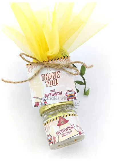 The complete fire truck-themed favor, with a personalized thank you tag and bright yellow net wrapping.