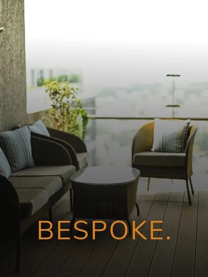 This image of a luxurious balcony lounge with the word "Bespoke" highlights my commitment to creating custom, high-end designs that are tailored to each client's unique lifestyle and space.