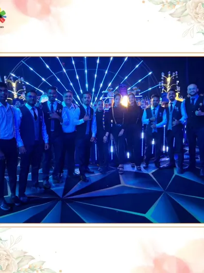 The team at a Hyderabad event, standing before a stunning light installation. We bring a polished and professional presence to every city.