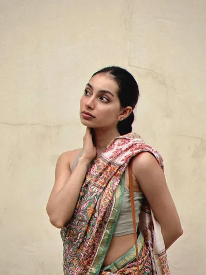 A casual and modern take on saree styling during a day out in Pondicherry. This shows how a traditional saree can be adapted for a contemporary, travel-friendly look.