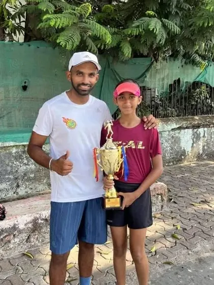Rumi Gadia with her coach after winning the Under-12 All India Championship Series tournament at P.J. Hindu Gymkhana, Mumbai.
