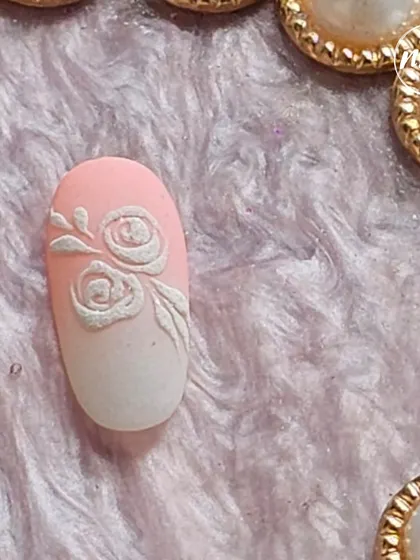A student's take on the embossed white rose design. The soft ombre background adds a lovely, modern touch.