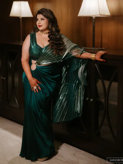Posing with confidence. This look is all about drama and sophistication for a grand reception evening.