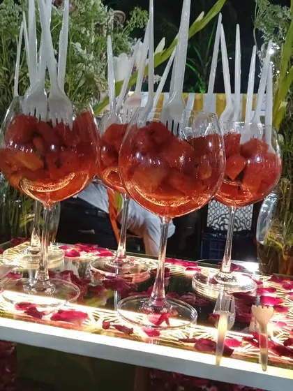 Another view of the watermelon salad glasses, ready to be served to guests at a wedding.